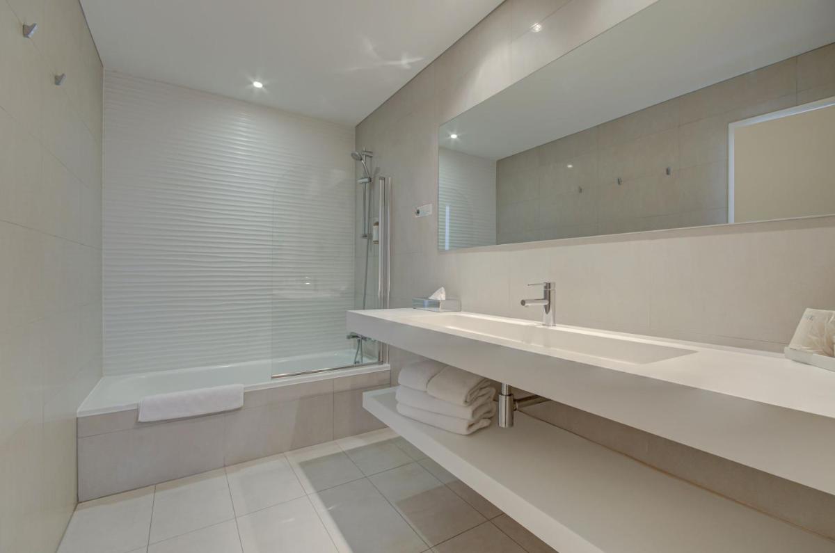 Salle de bains dans l'établissement Le Cottage - Hotel & Spa