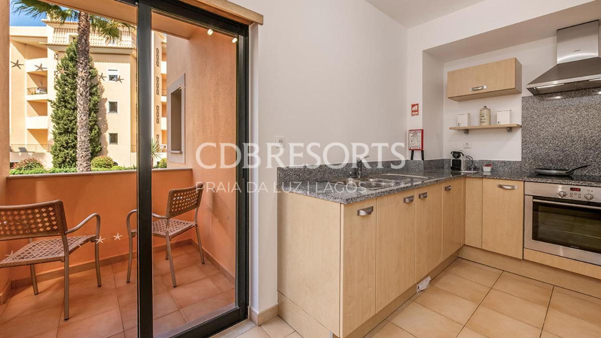 A cozinha ou kitchenette de Estrela da Luz Resort