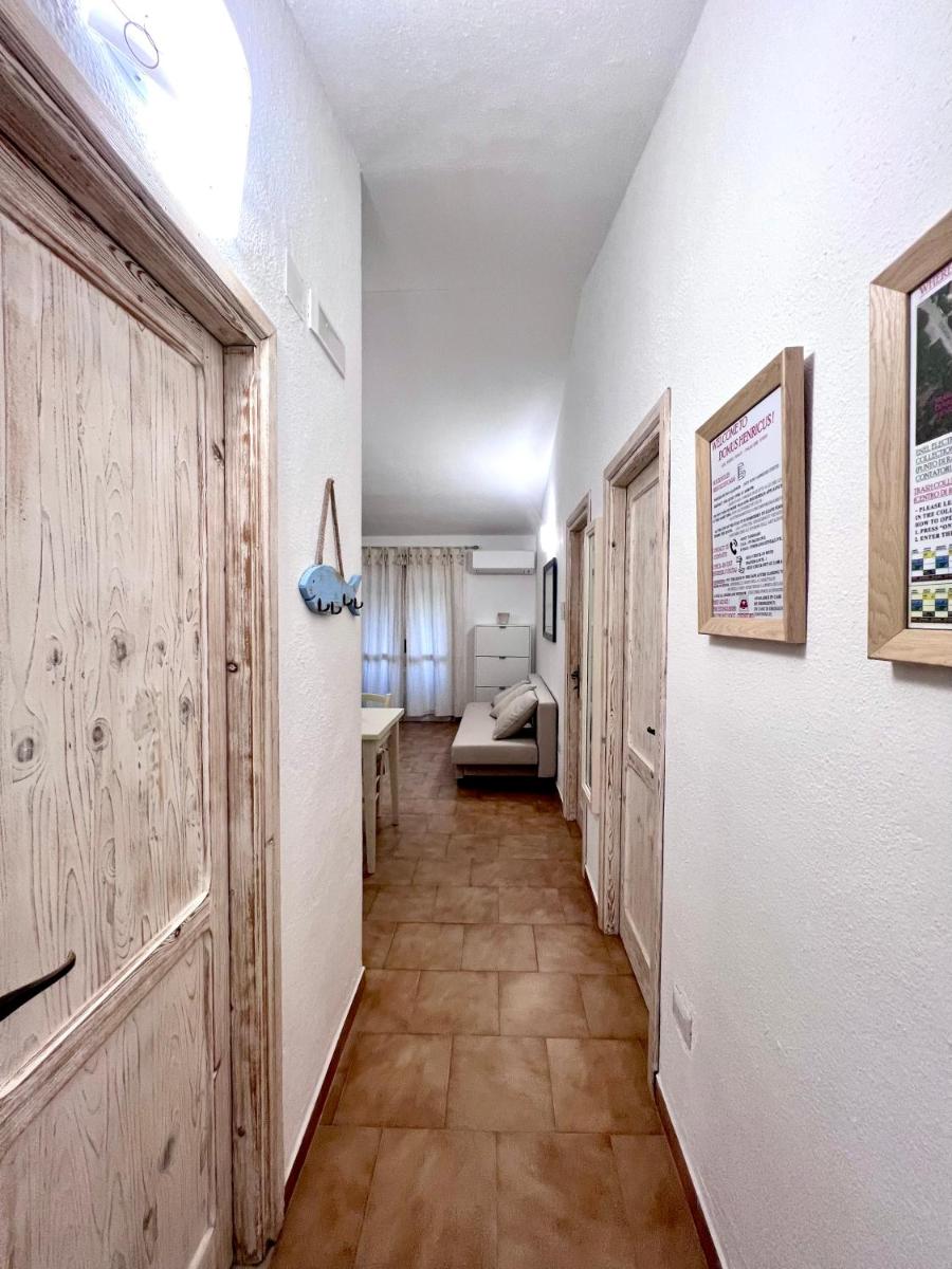 DOMUS HENRICUS -THREEROOM APARTMENT IN PORTO POLLO 400 Meters from the sea - Housity