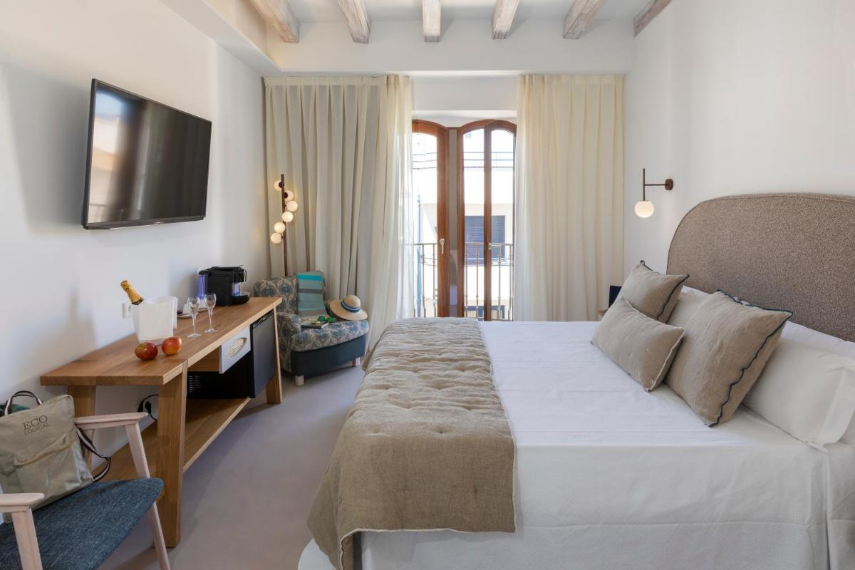 Cama o camas de una habitación en Hotel Spa Porto Cristo