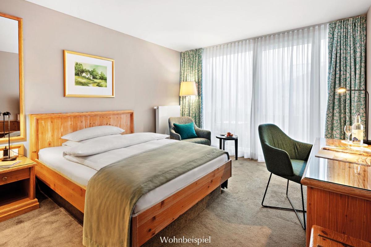 Ein Bett oder Betten in einem Zimmer der Unterkunft Allgäu Sonne