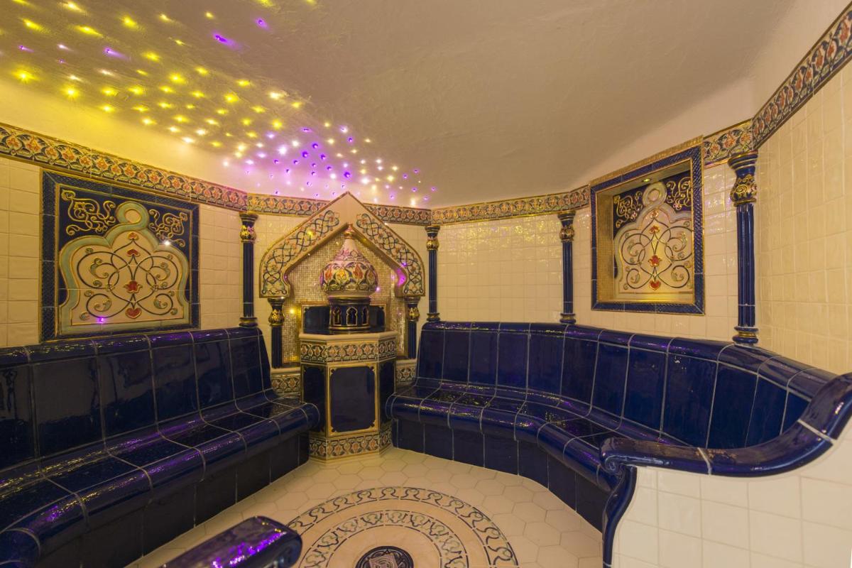 Coin salon dans l'établissement Alexain Hotel Restaurant & Wellness - Colmar Ouest