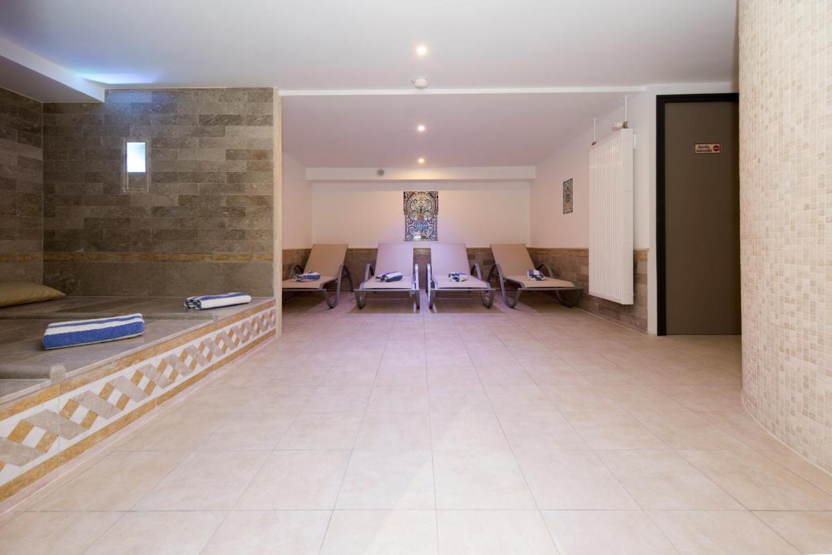 Coin salon dans l'établissement Alexain Hotel Restaurant & Wellness - Colmar Ouest