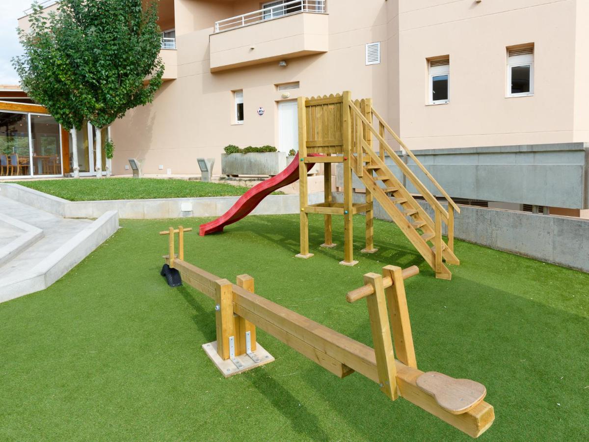 Zona de juegos infantil en Aparthotel Dunes Platja