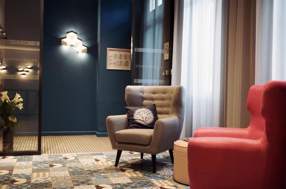 Coin salon dans l'établissement Alex Hotel & Spa