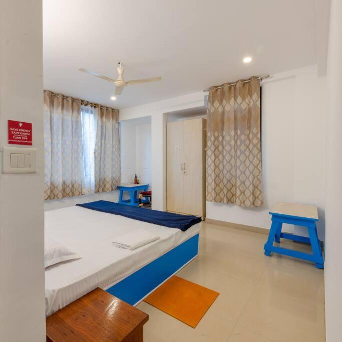 Cozy blue nook-Classy 2BHK in the heart of Mysuru - Housity