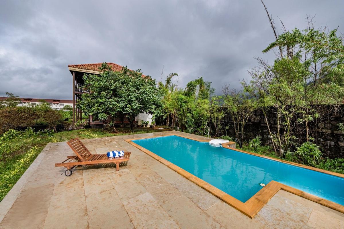 SaffronStays Boulevard LogHouse - a wooden chalet amidst nature - Housity