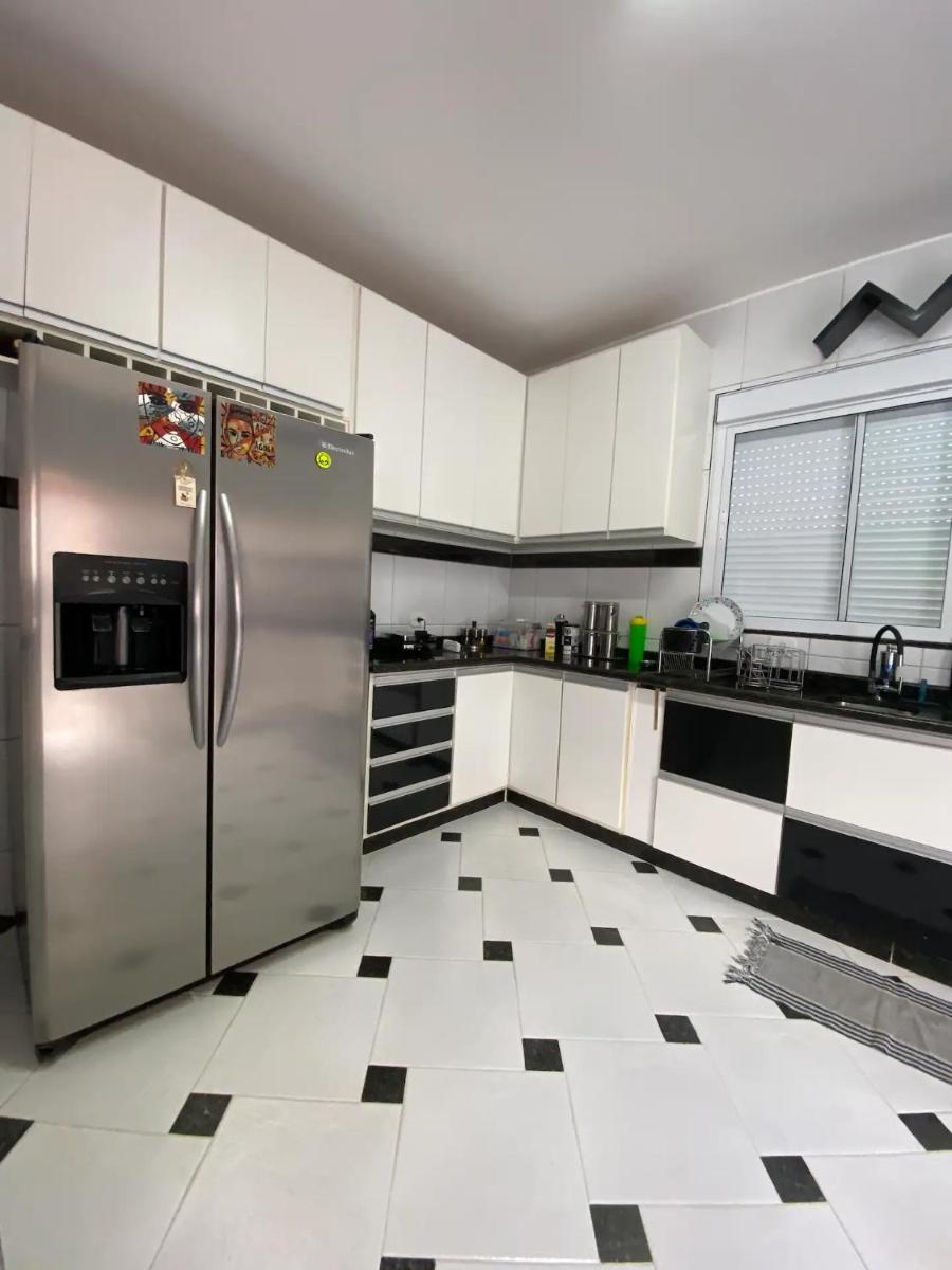 Casa, com linda área de lazer e piscina aquecida - Housity