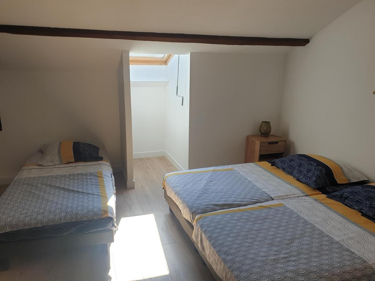 Charmante maison mitoyenne sur 2 niveaux - Housity