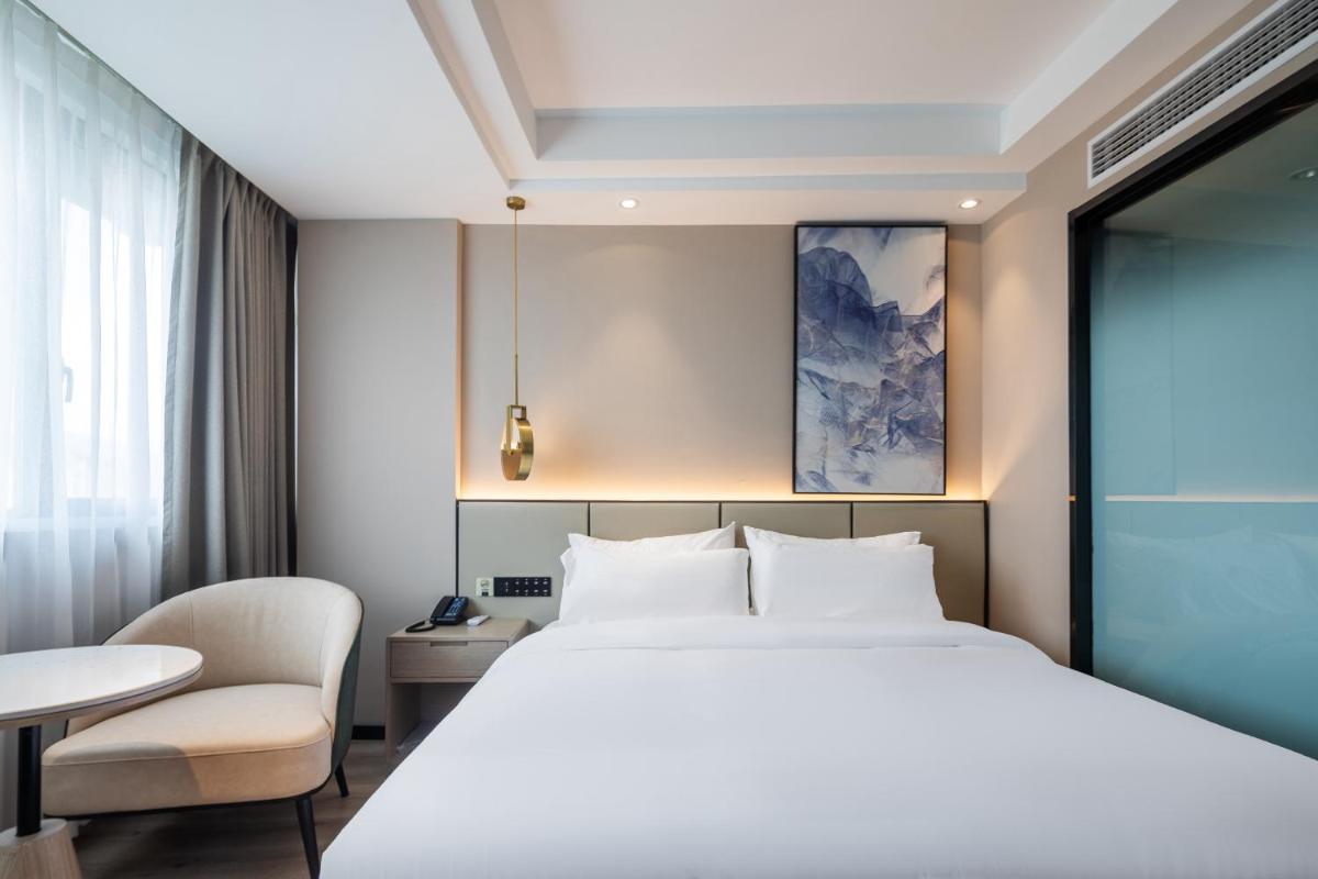 Xinhuating Business Hotel - Housity