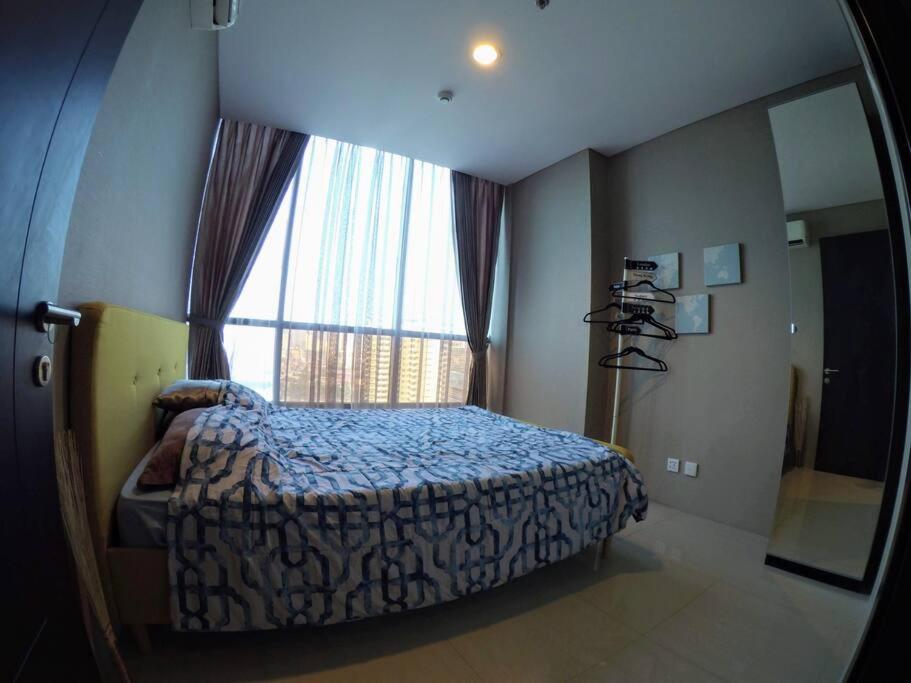 Strategic Cozy Hang Out Apartment, GP Plaza - Housity