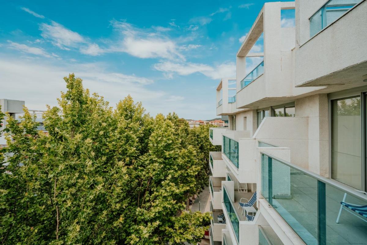 Un balcón o terraza de Blaumar Hotel