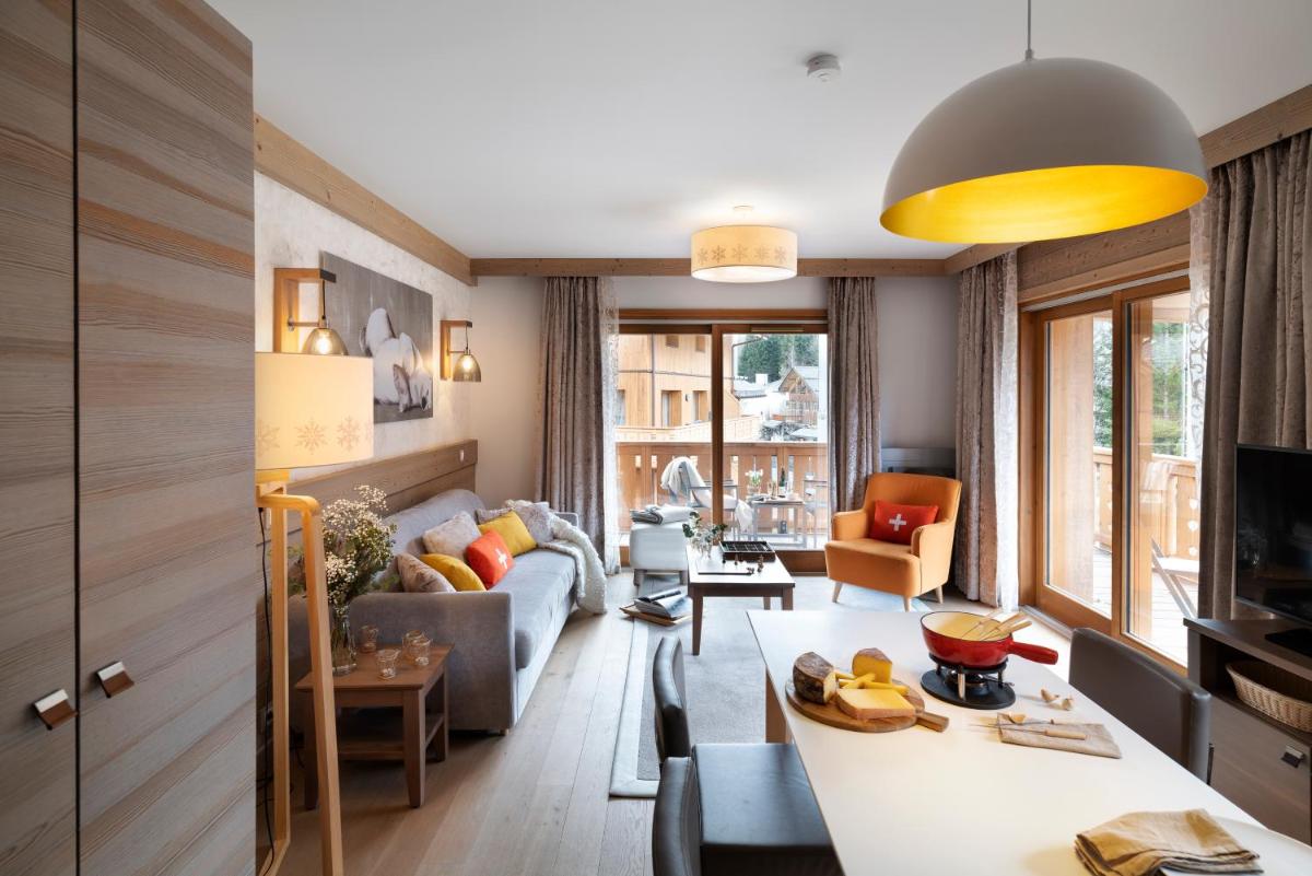 Coin salon dans l'établissement Résidence Pierre & Vacances Premium L'Hévana