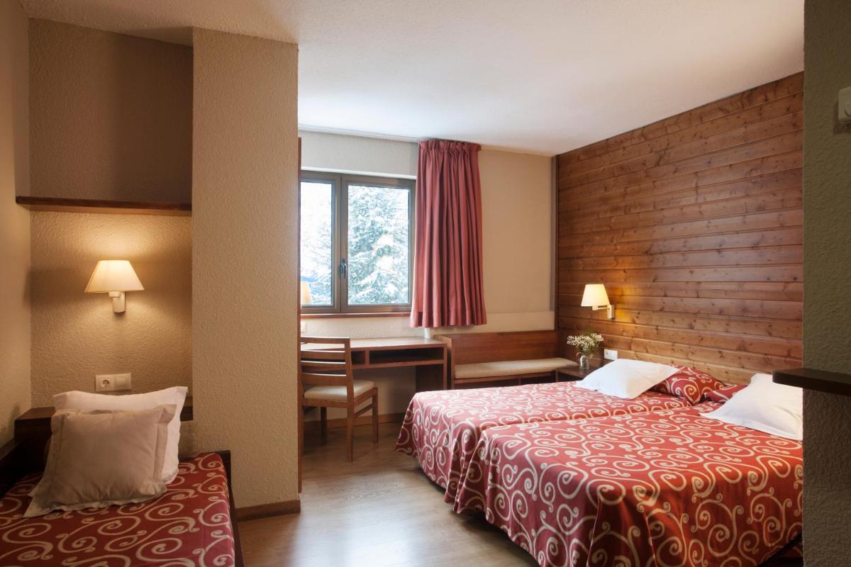 Cama o camas de una habitación en Tuc Blanc