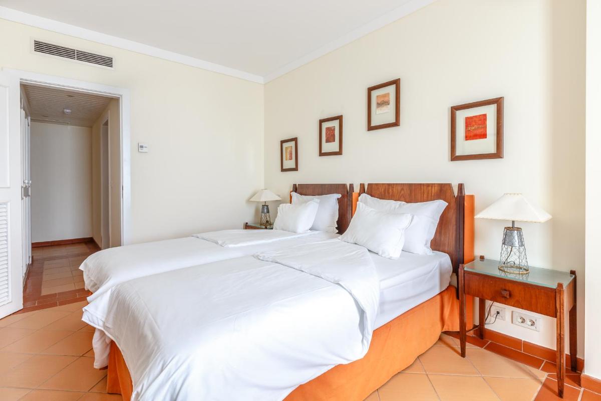 Uma cama ou camas num quarto em Hotel Golf Mar