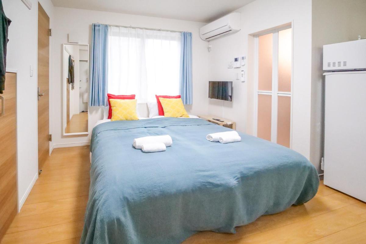 Triphome Tateishi New open/2 single beds/big table/300M WiFi - Housity