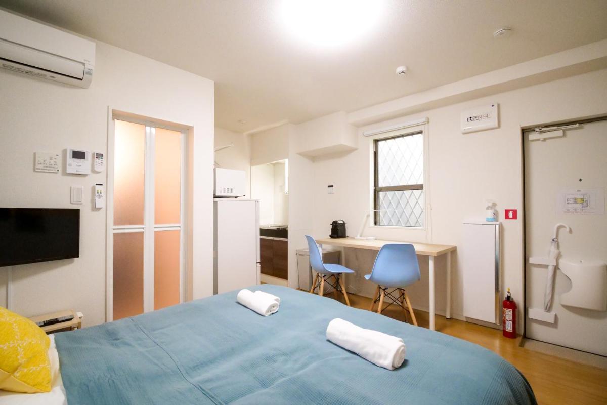 Triphome Tateishi New open/2 single beds/big table/300M WiFi - Housity