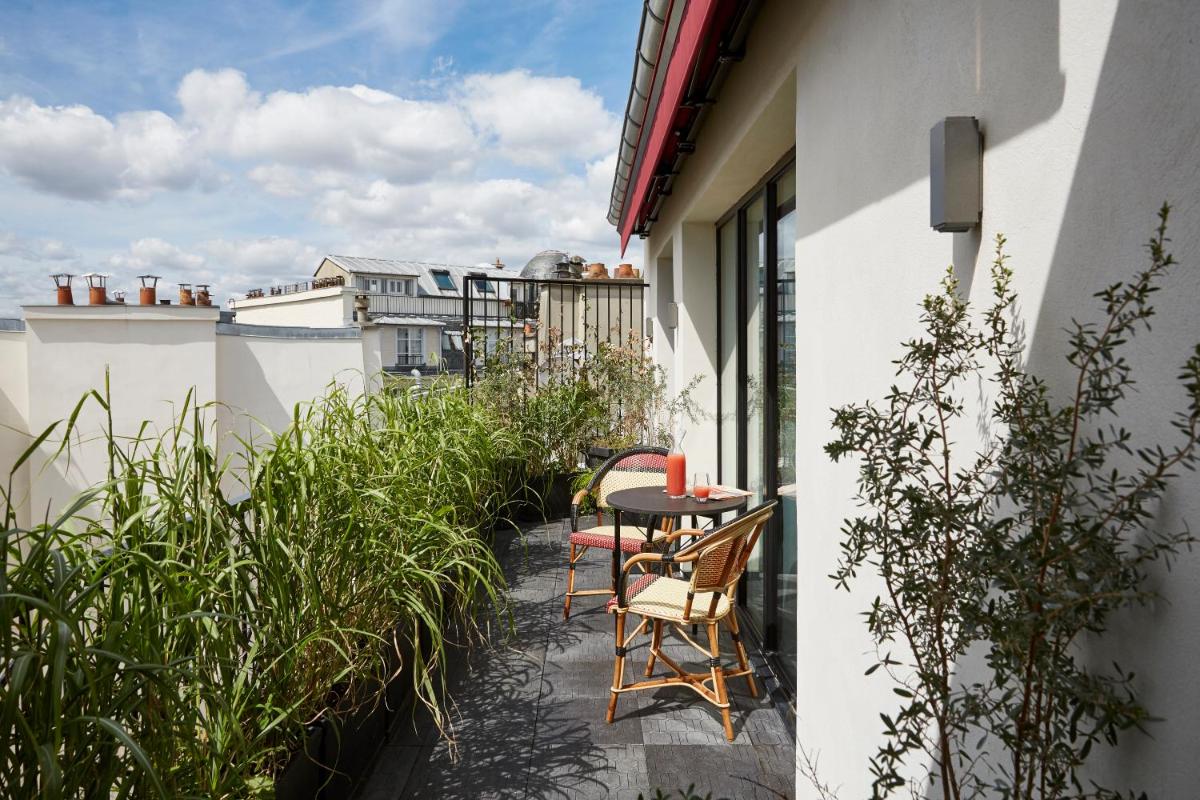 Balcon ou terrasse dans l'établissement Le Roch Hotel & Spa
