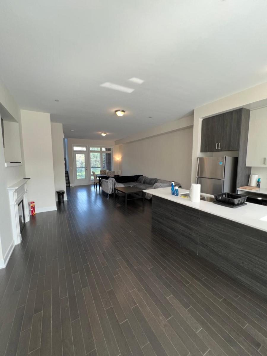 Cheerful 4-Bedroom Townhouse with a Suburban Feel! - Housity