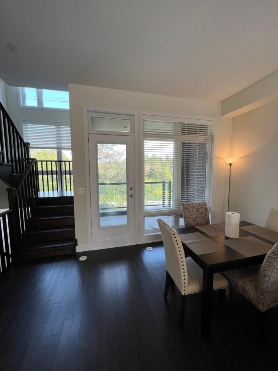 Cheerful 4-Bedroom Townhouse with a Suburban Feel! - Housity