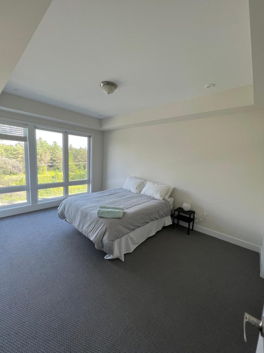 Cheerful 4-Bedroom Townhouse with a Suburban Feel! - Housity