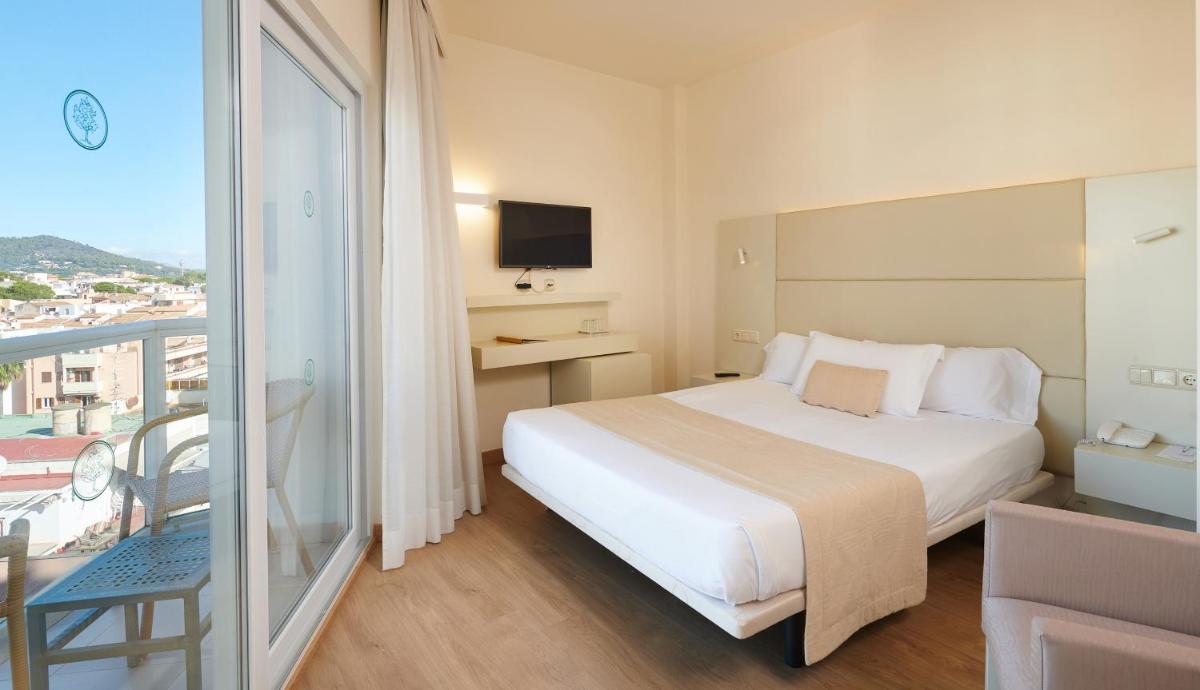 Cama o camas de una habitación en Hotel Sabina