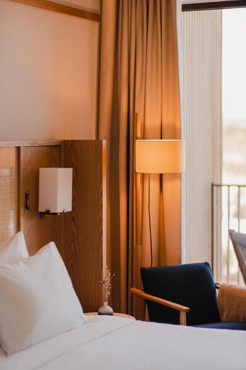 Uma cama ou camas num quarto em Aethos Ericeira