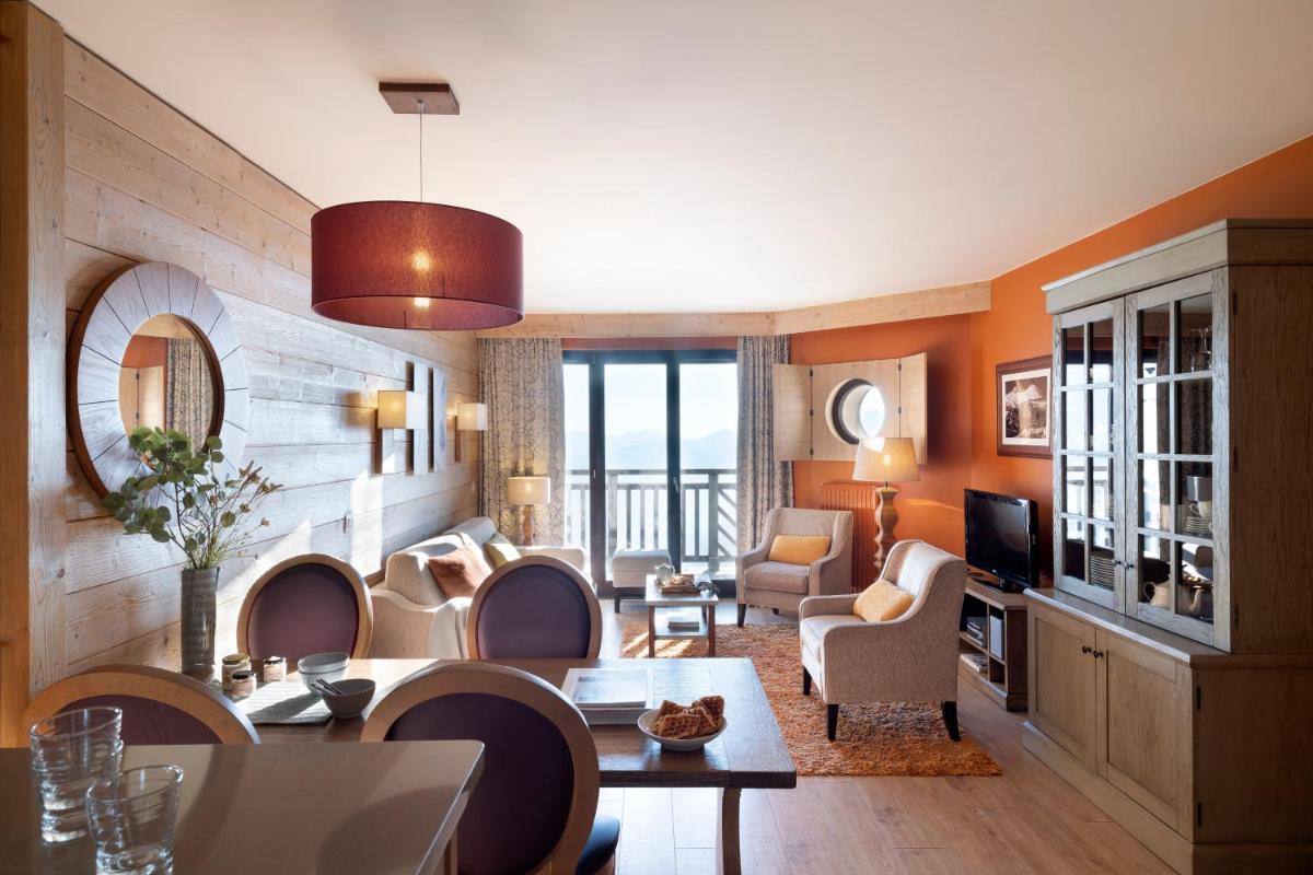 Coin salon dans l'établissement Résidence Pierre & Vacances Premium L'Amara