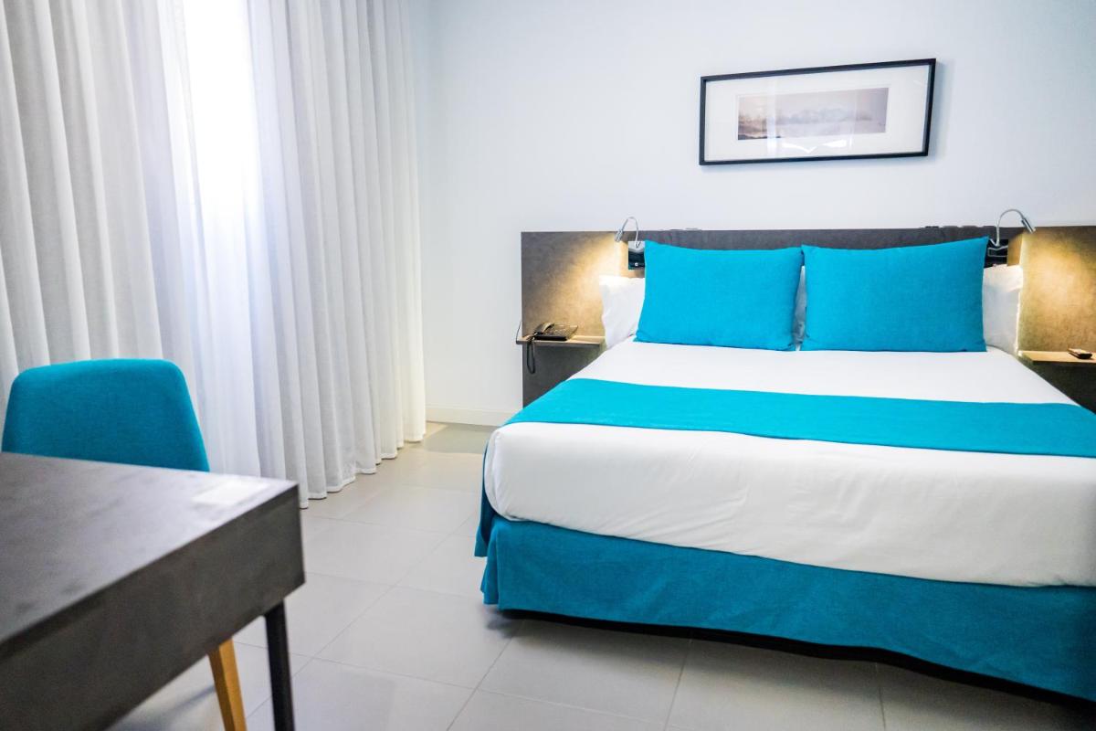 Cama o camas de una habitación en Moon Hotel & SPA.