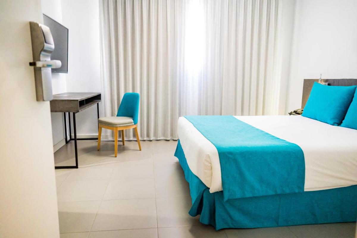 Cama o camas de una habitación en Moon Hotel & SPA.