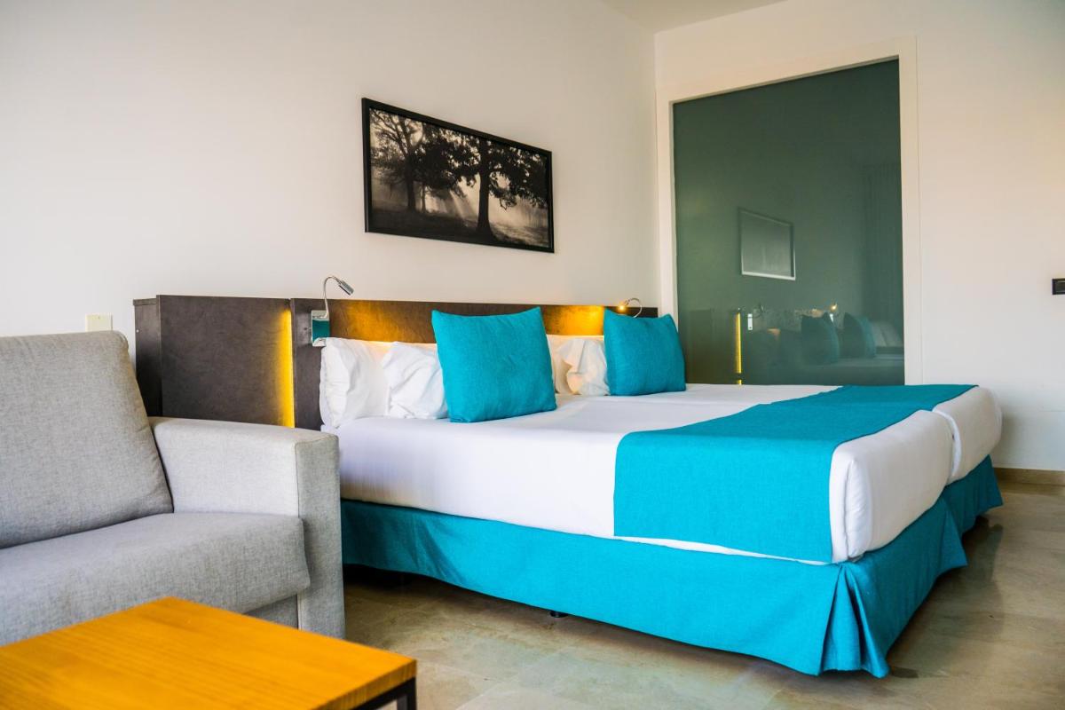 Cama o camas de una habitación en Moon Hotel & SPA.