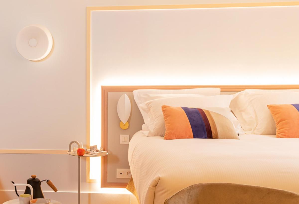 Un ou plusieurs lits dans un hébergement de l'établissement Aiden by Best Western Clermont-Ferrand Hotel & Spa