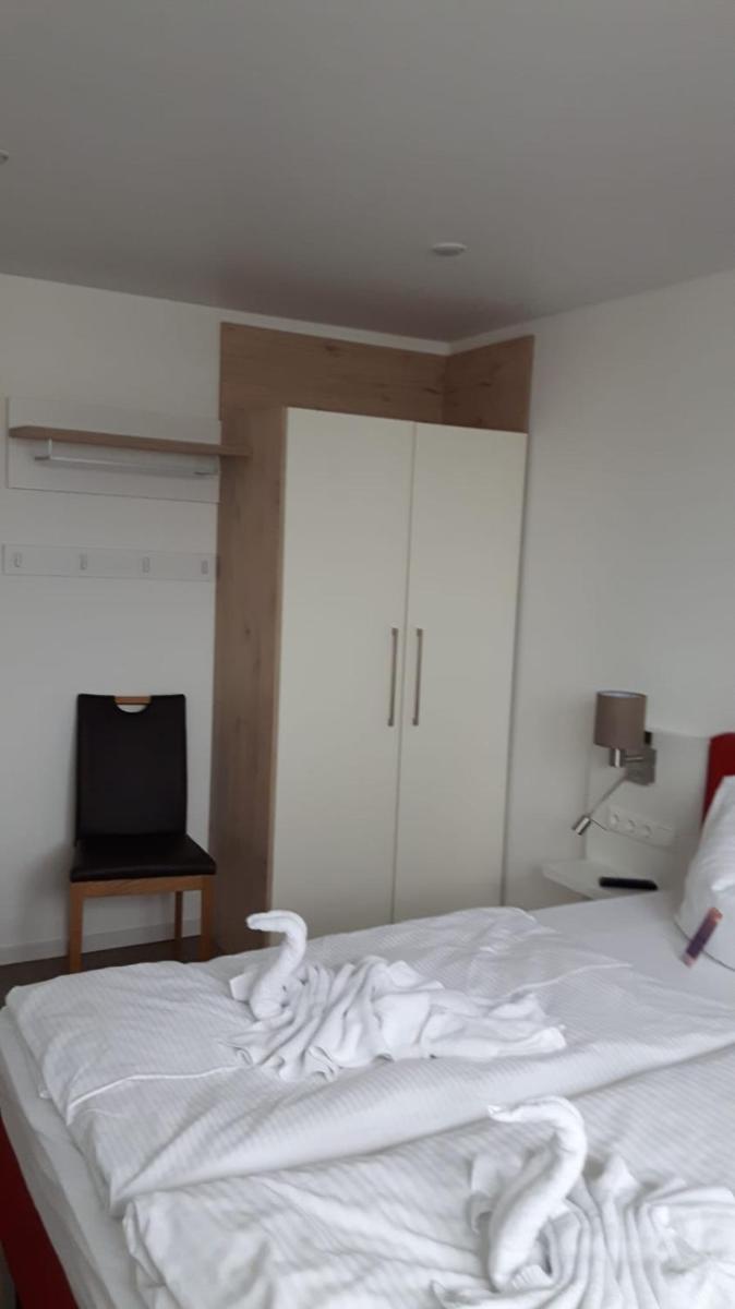 Ein Bett oder Betten in einem Zimmer der Unterkunft Schwimmende Häuser im BALTIC SEA RESORT