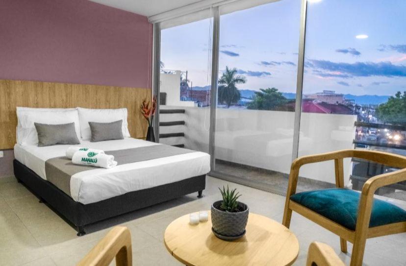 Hotel Manalú Girardot - Housity