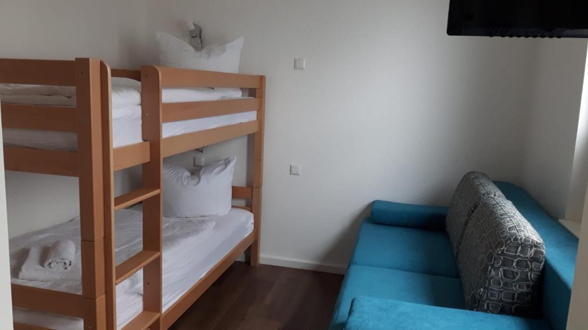 Ein Bett oder Betten in einem Zimmer der Unterkunft Schwimmende Häuser im BALTIC SEA RESORT