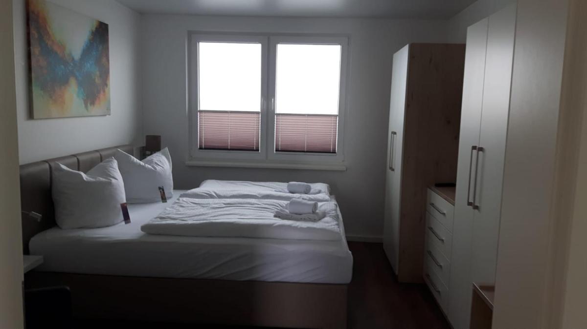 Ein Bett oder Betten in einem Zimmer der Unterkunft Schwimmende Häuser im BALTIC SEA RESORT