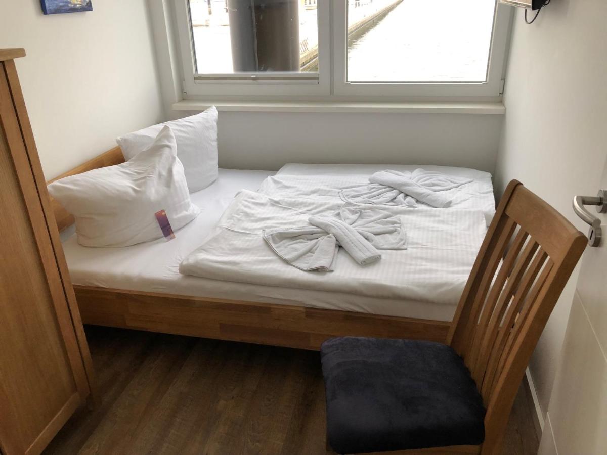 Ein Bett oder Betten in einem Zimmer der Unterkunft Schwimmende Häuser im BALTIC SEA RESORT