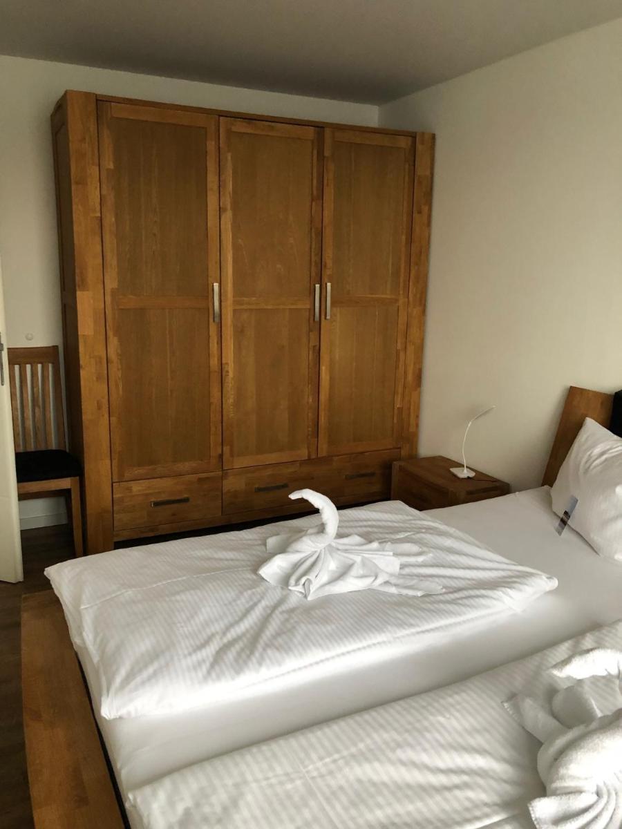 Ein Bett oder Betten in einem Zimmer der Unterkunft Schwimmende Häuser im BALTIC SEA RESORT