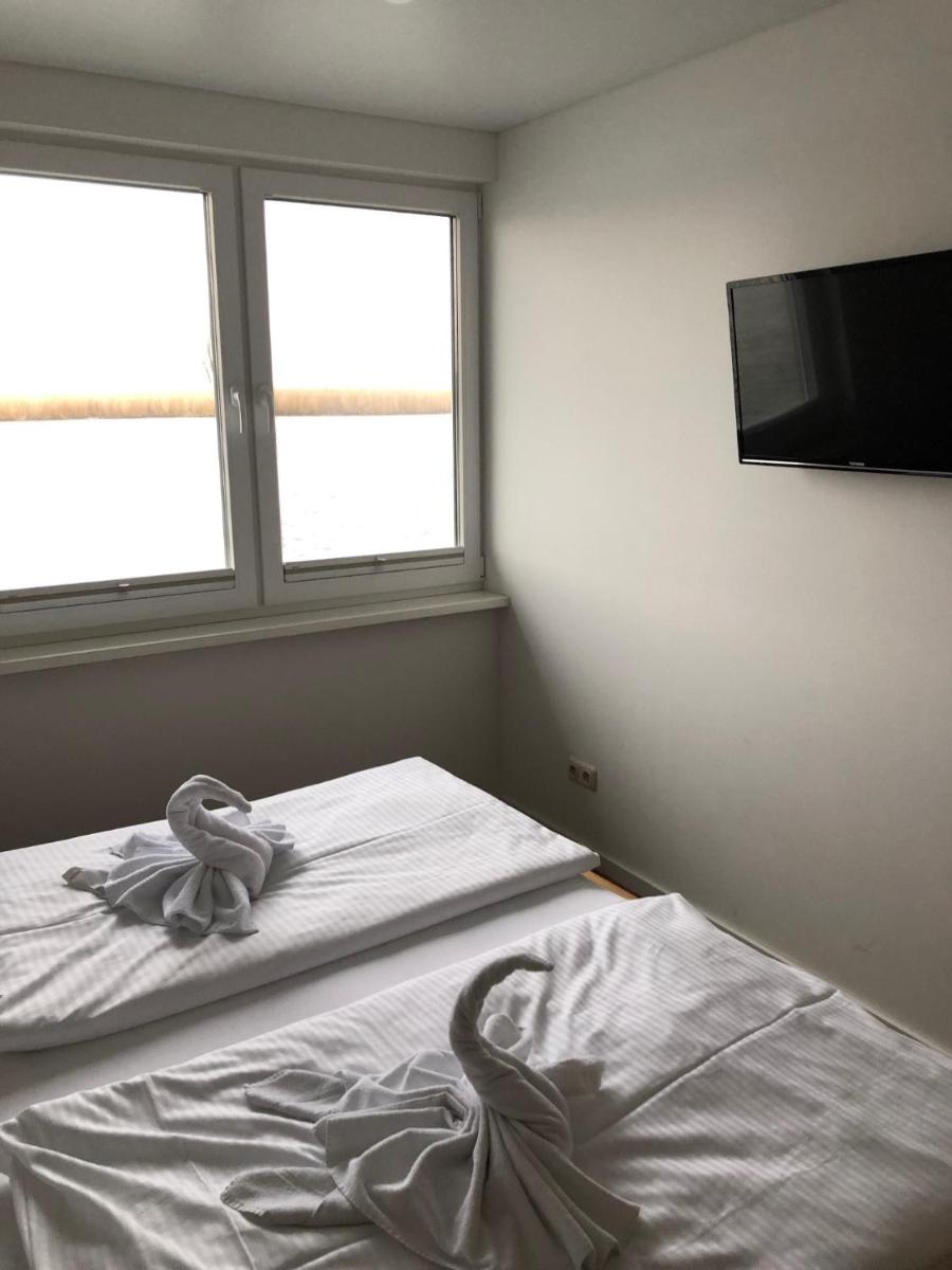 Ein Bett oder Betten in einem Zimmer der Unterkunft Schwimmende Häuser im BALTIC SEA RESORT