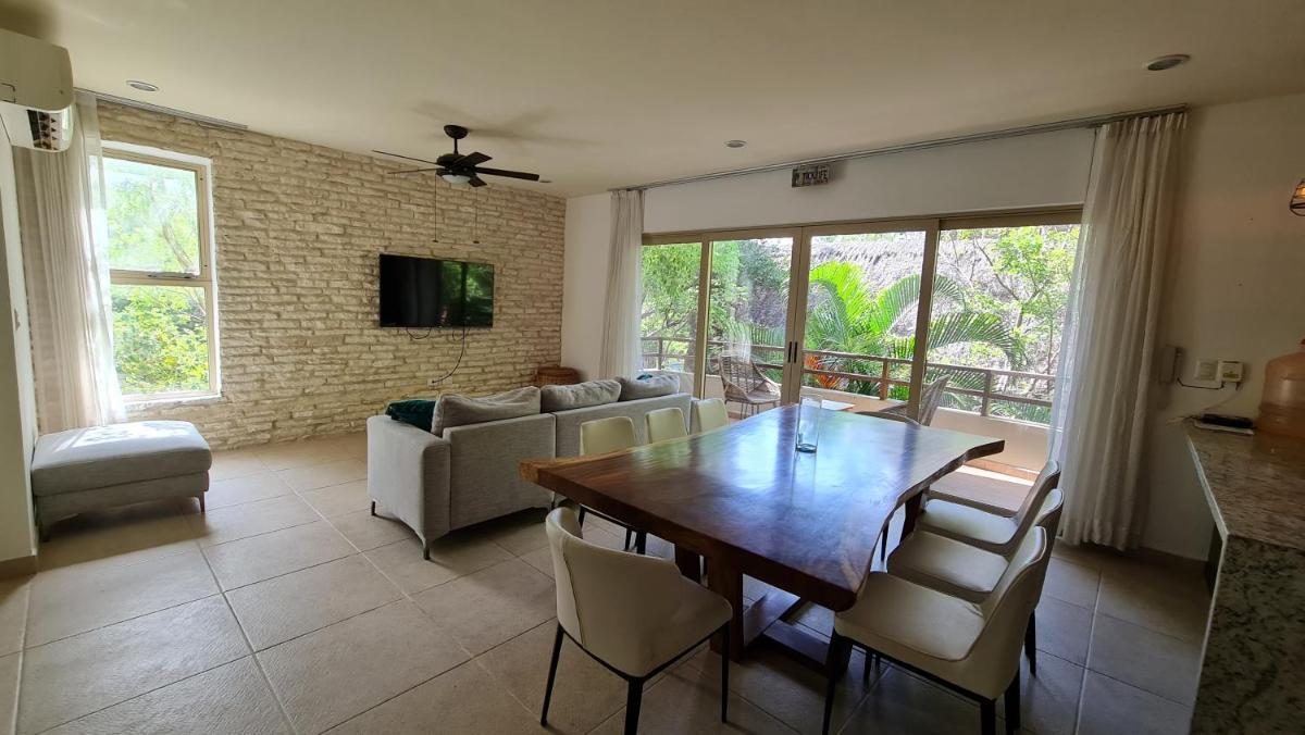 Outstanding Duplex Condo w/rooftop in Tulum - Housity