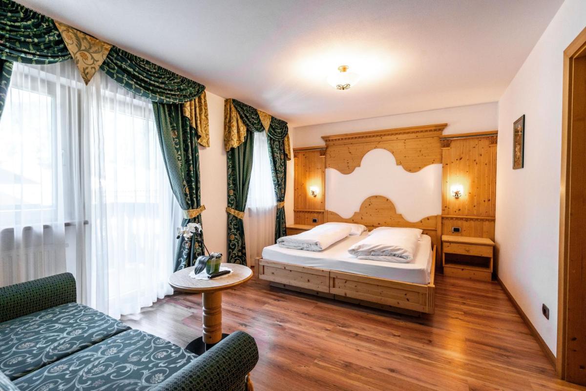 Garni Hotel and Apartments Wildbach - Housity