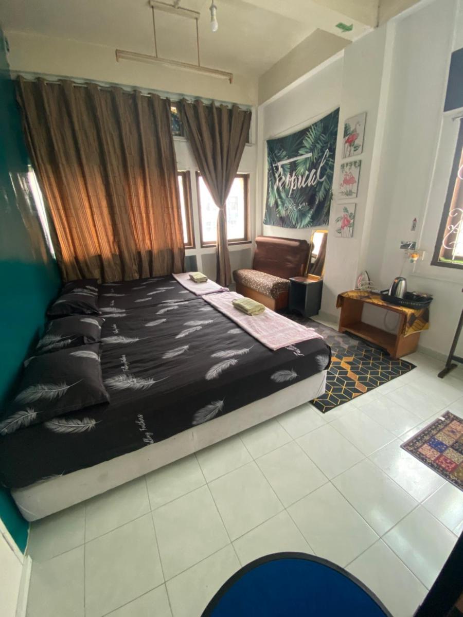 Pesona Backpackers Inn - Housity