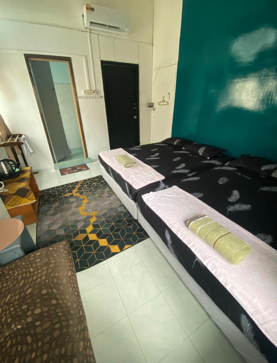 Pesona Backpackers Inn - Housity