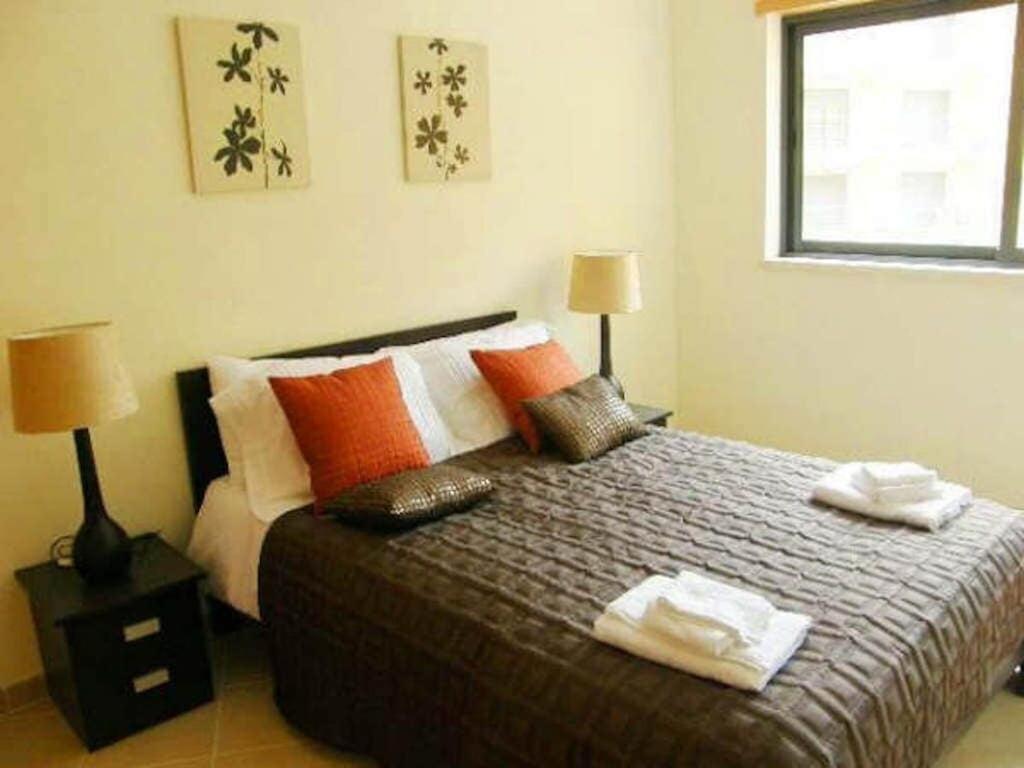 Luxury two BR pool view beach side apartment at Algarve's longest beach - Housity