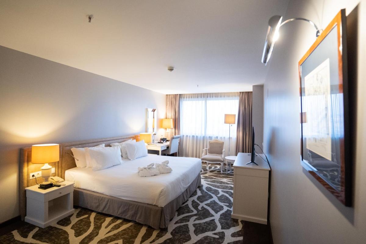 Uma cama ou camas num quarto em Holiday Inn Porto Gaia by IHG