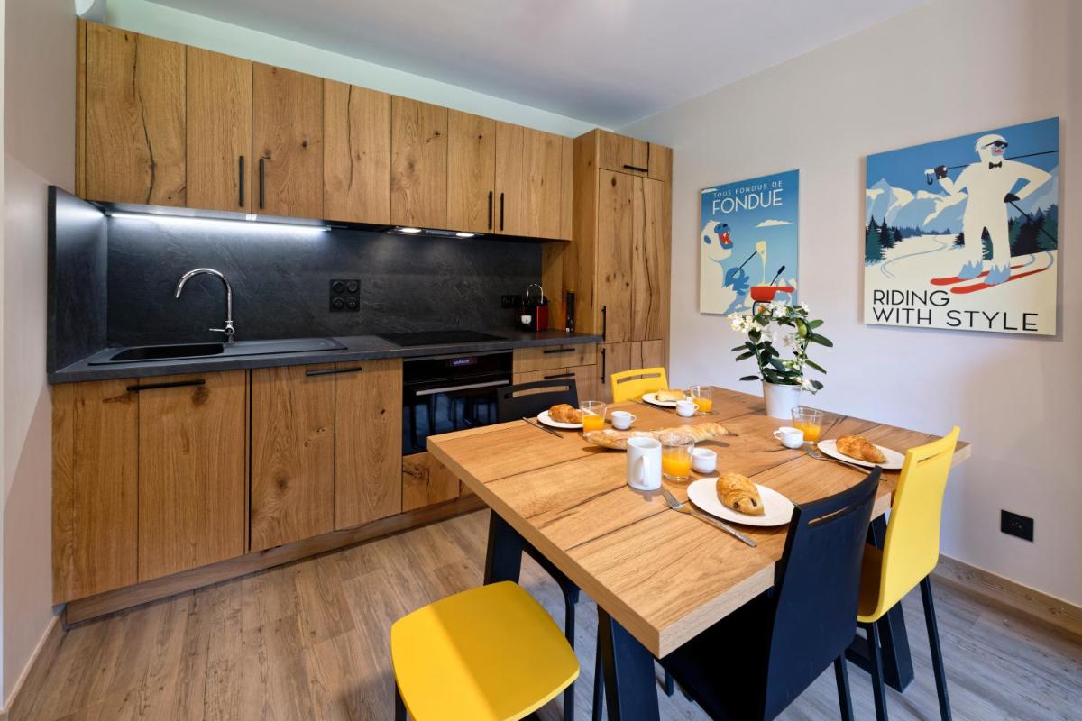 Cuisine ou kitchenette dans l'établissement Résidence Club MMV Samoens
