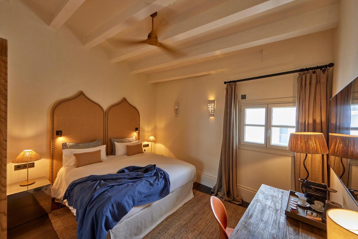 Cama o camas de una habitación en Puro Grand Hotel