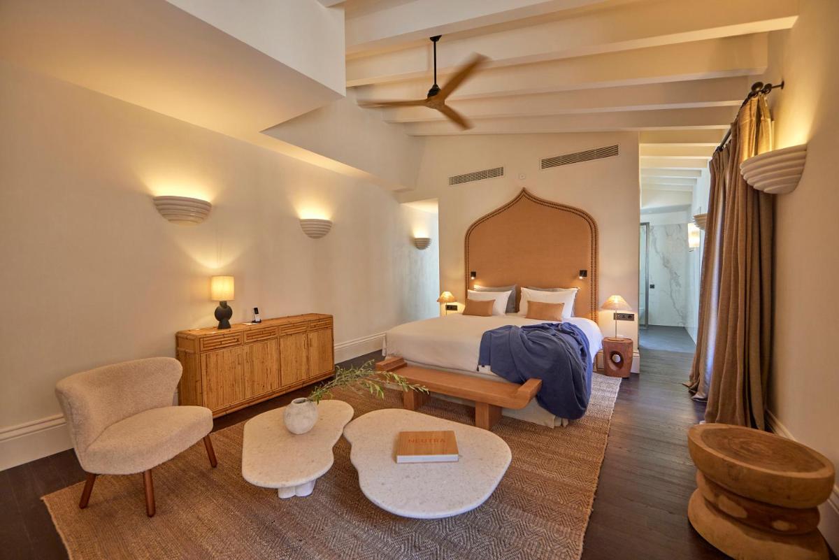Cama o camas de una habitación en Puro Grand Hotel