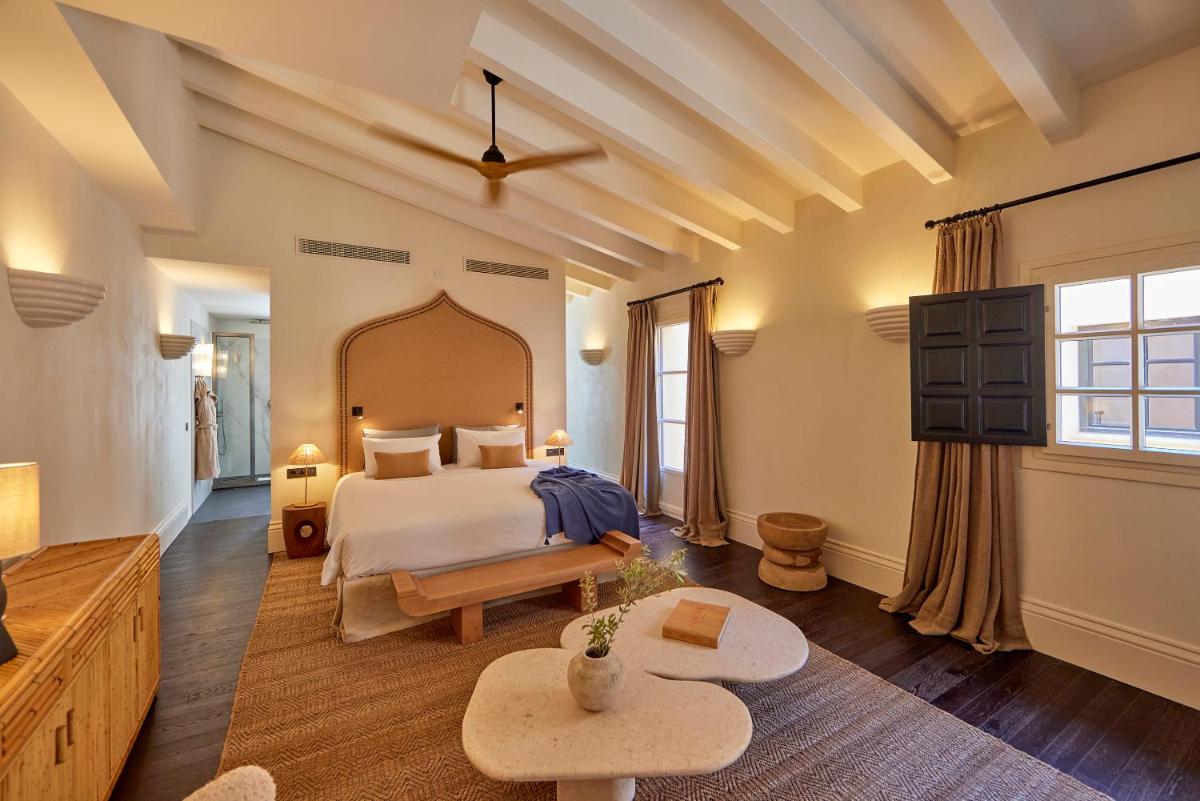 Cama o camas de una habitación en Puro Grand Hotel