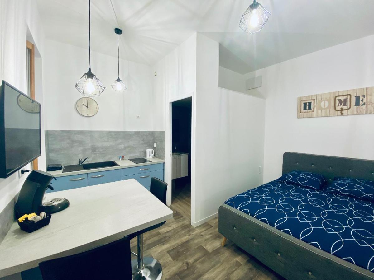 Studio neuf bien placé, jardin et parking gratuit - Housity